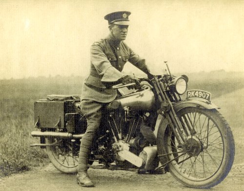 TE lawrence of arabia in military uniform on motorcycle 