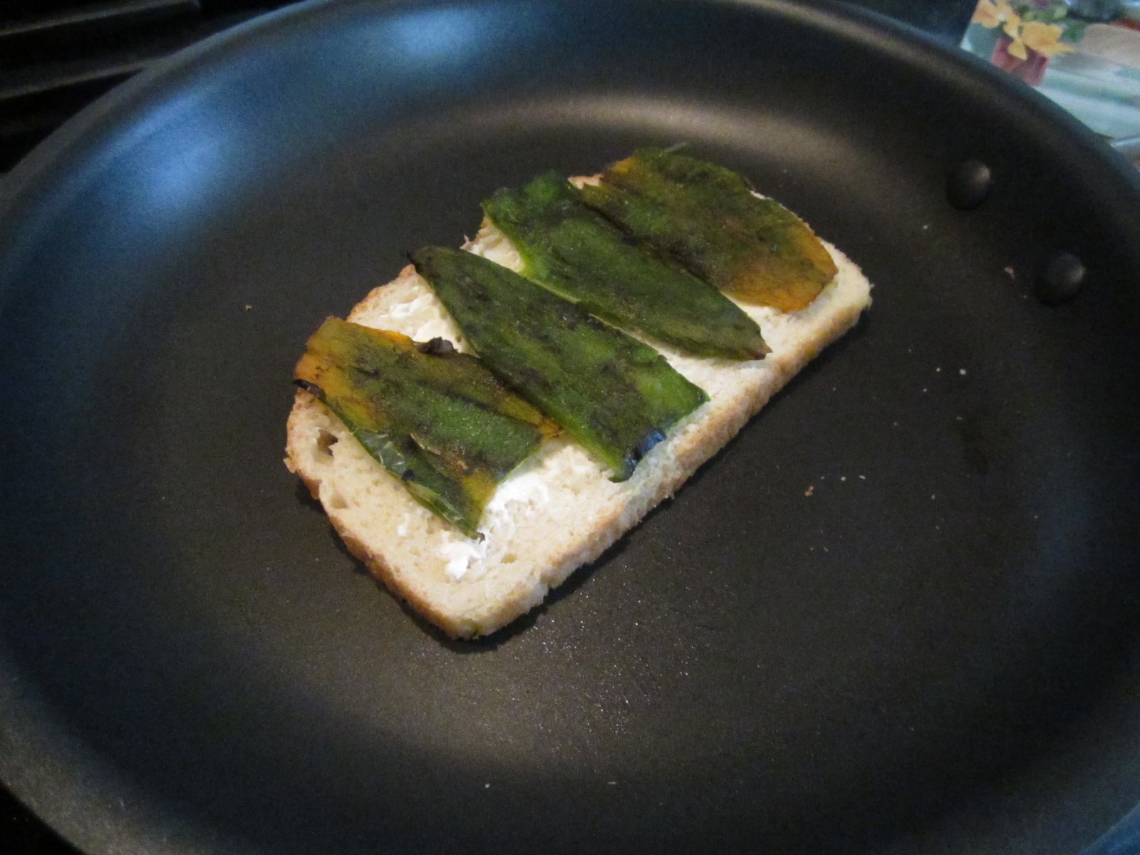 The two pepper, cut lengthwise, fit perfectly onto the piece of bread. I'll bet that was planned...