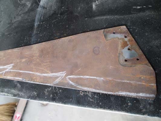 Step 2: Transfer the design to your metal stock. Using a piece of chalk or soapstone, trace your pattern onto the old saw blade. It doesn’t have to be perfect, as you will be using your eyes as you go, and you will be filing away any imperfections. 