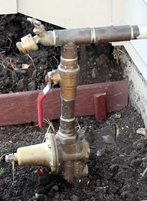A typical outdoor main water shut off. 