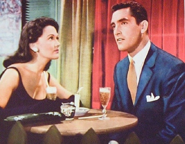 vintage couple on date man looking away eye contact