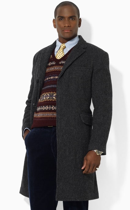 african american black man wearing gray overcoat over sweater.