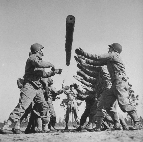 vintage soldiers tossing log basic training 
