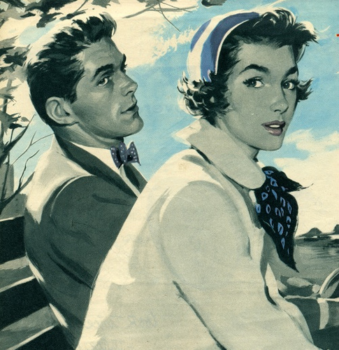 A man and woman enjoying a peaceful boat ride.