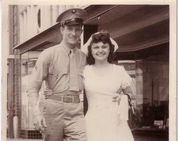 Get creative with your date ideas by exploring an old photo featuring a man and woman in uniform.