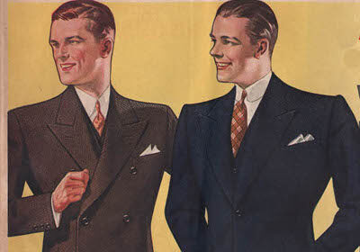 Two men in suits standing next to each other, showcasing the essence of Art of Manliness and the principles taught at Suit School.