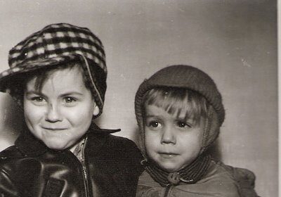 Two brothers in leather jackets posing for a photo, forging a bond.