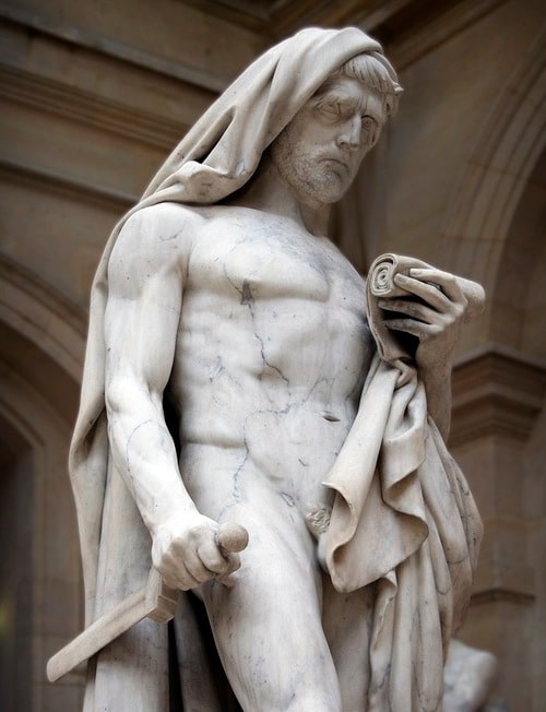 A statue of Cato, a self-made man holding a sword, serving as a symbol of valuable lessons.