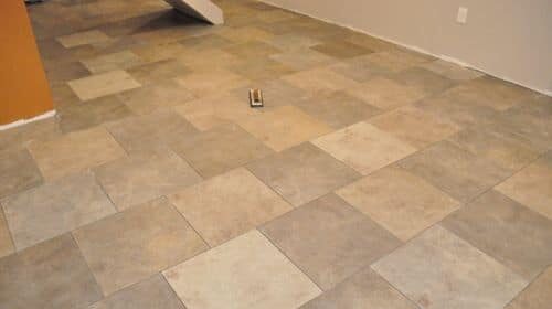 How to grout a tile floor in a room with a stairway.