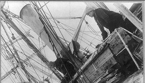 A truly valuable black and white photo of an Antarctic expedition ship in the snow.