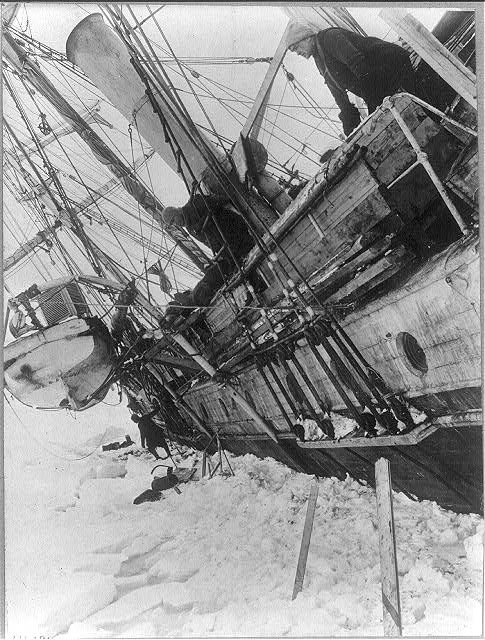 A truly valuable black and white photo of an Antarctic expedition ship in the snow.