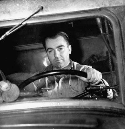 A mundane man finding meaning in the driver's seat of a truck.