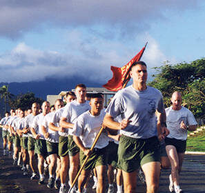 A group of men participating in the 30 Days to a Better Man challenge, engaging in the Marine Corps Fitness Test.