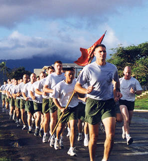 A group of men participating in the 30 Days to a Better Man challenge, engaging in the Marine Corps Fitness Test.