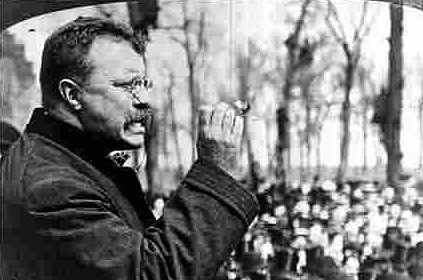 An old photo of Theodore Roosevelt speaking to a crowd.