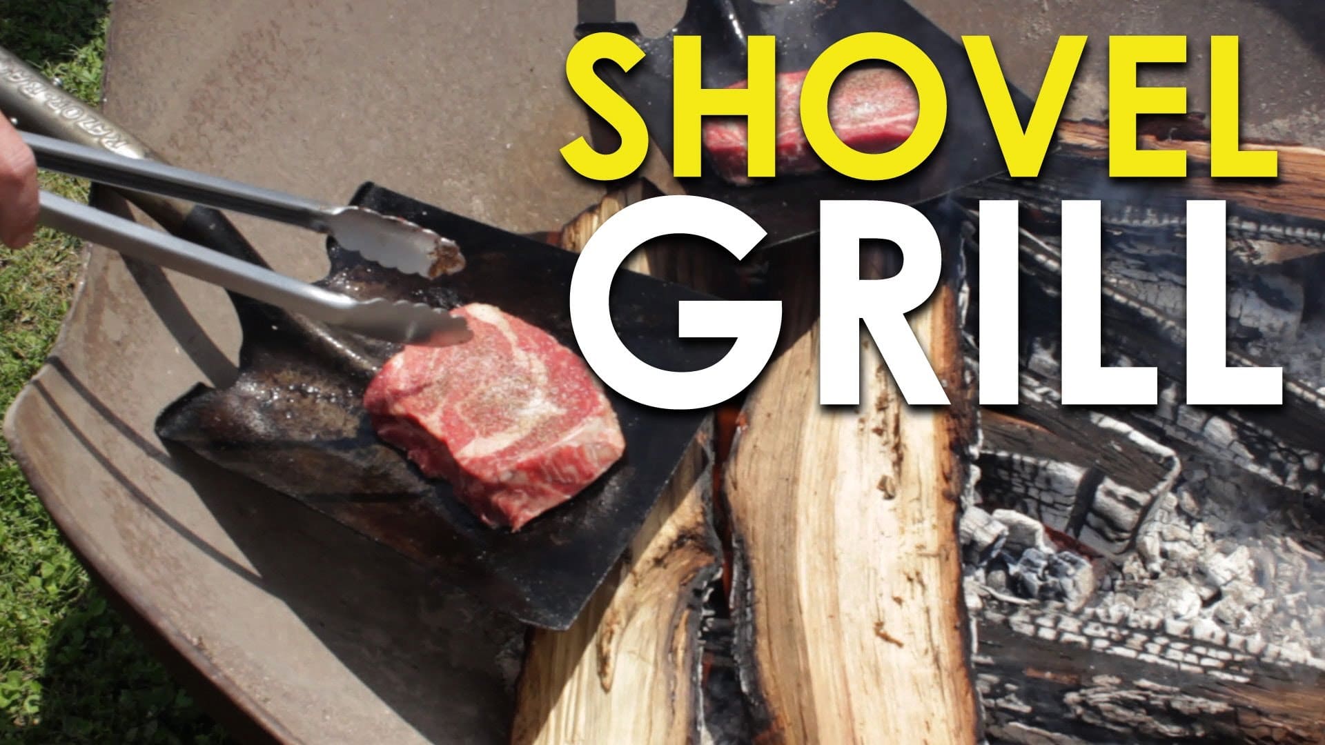 Using a shovel grill, the person is cooking a steak.