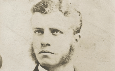 A bearded man in the photo looks distinguished.