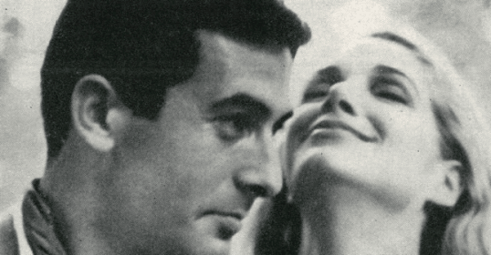 A black and white photo of a man and woman capturing the essence of masculinity.