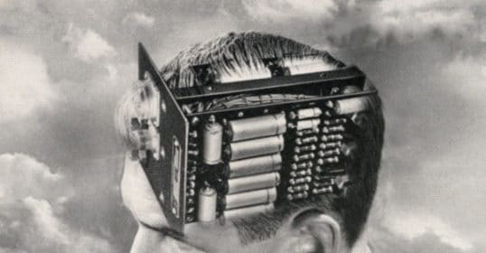 An old photograph of a man with a computer in his head, striving to improve his working memory.