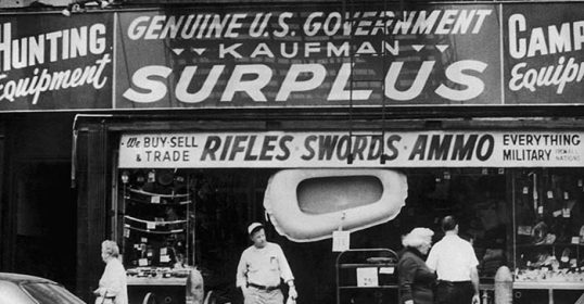 An old black and white photo of an army surplus store.
