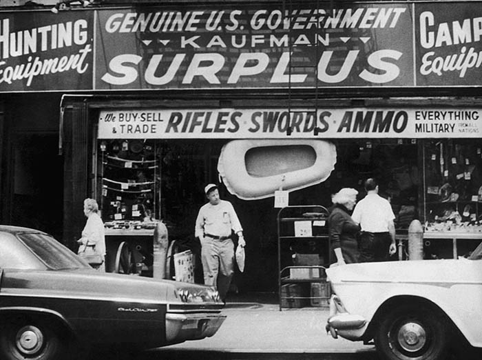 An old black and white photo of an army surplus store.