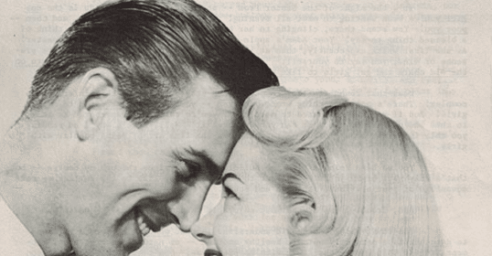 A woman and man are smiling at each other in an old newspaper.