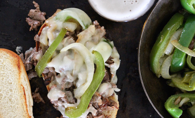An authentic Philly Cheesesteak on a plate.