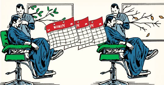 A man is sitting in a chair with a calendar, waiting for his haircut to last longer.