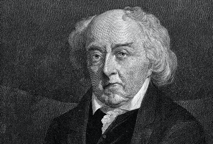 An engraving of a man in a suit, black and white.