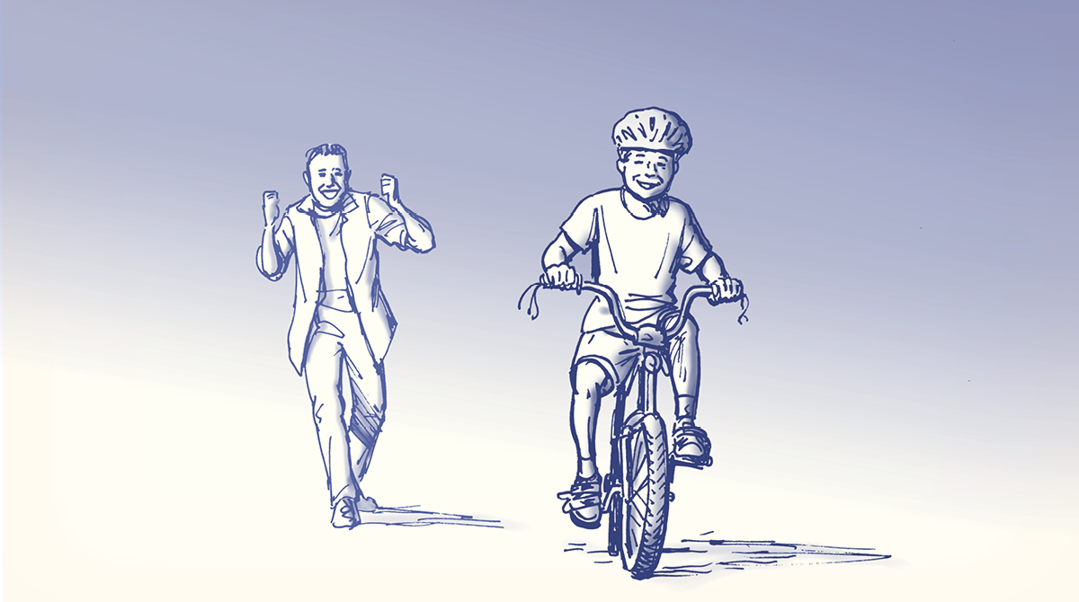A man rides a bicycle.