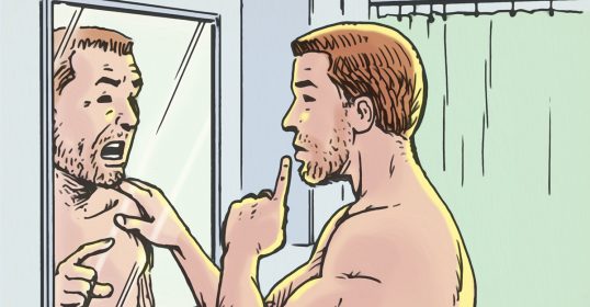A man is stopping negative self-talk while looking at himself in the mirror.