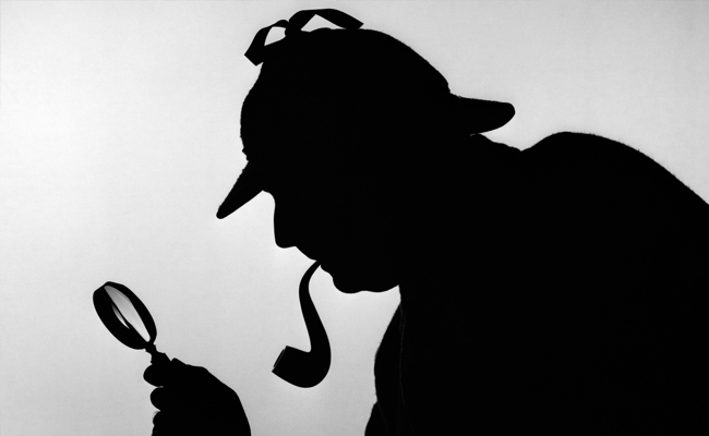 A silhouette of a man holding a magnifying glass, reminiscent of Sherlock Holmes.