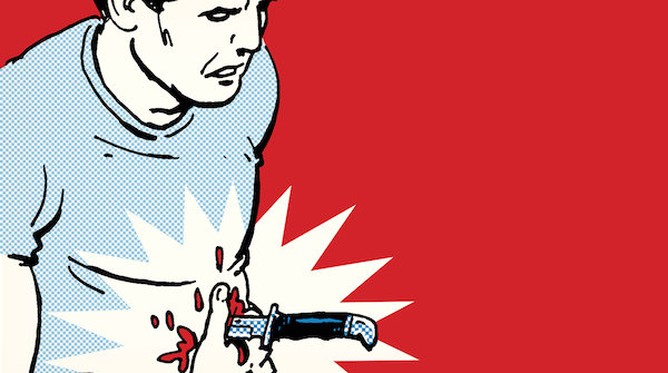 A man with an impalement wound in his stomach is being treated.