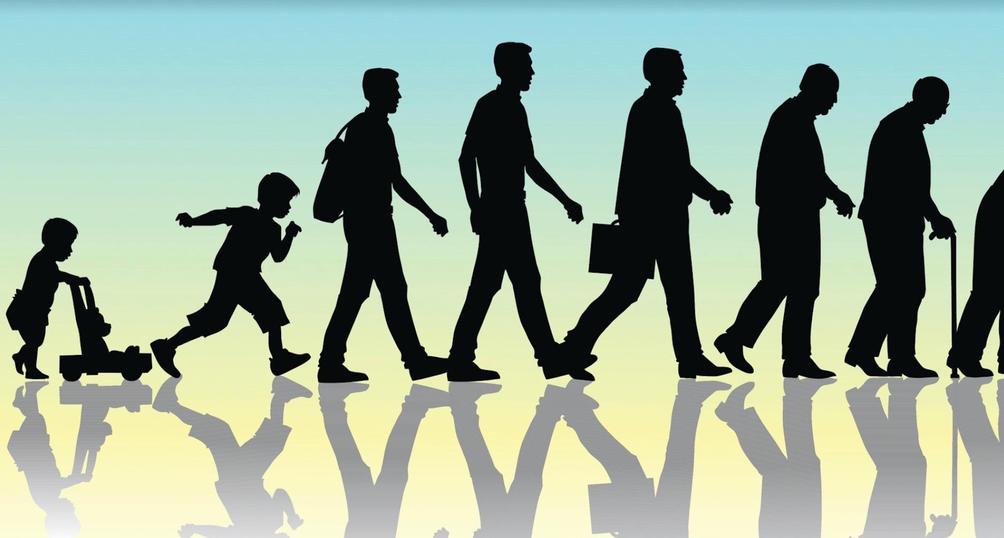 A silhouette of a group of people walking down the street.