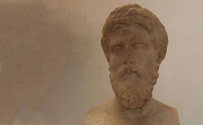 A bust of a man with a beard depicts signs of character.