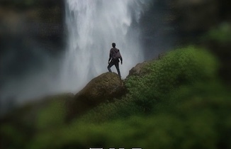 The movie poster for The Jungle Book with a man standing in front of a waterfall was featured on the Men Without Chests podcast.