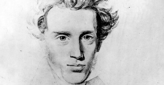 A drawing of a man with curly hair in the present age.