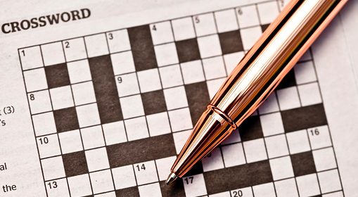 Why is there a pen on top of the crossword puzzle?