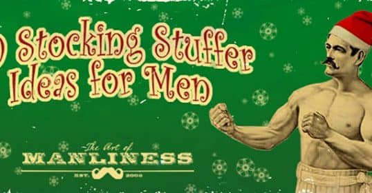 Vintage-style advertisement with a shirtless man in a santa hat promoting 