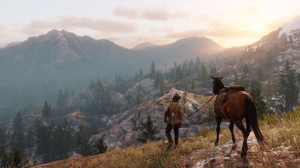 A character from Red Dead Redemption 2 stands next to a horse, overlooking a mountainous landscape at sunset.