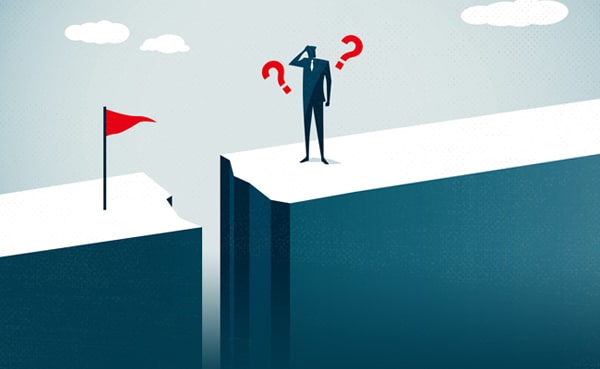 A conceptual illustration of a person standing at the edge of a cliff, facing a gap with goal disengagement on the other side, symbolizing challenge and uncertainty.