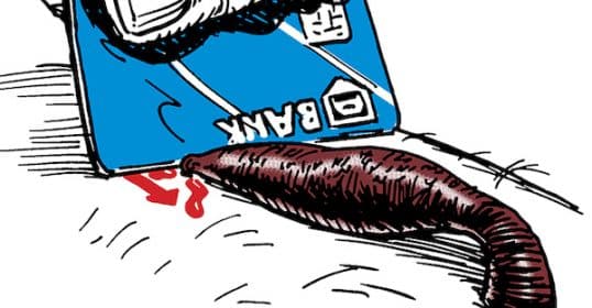 A spilled carton of milk and a chocolate-covered banana lying on a surface, next to a guide labeled 