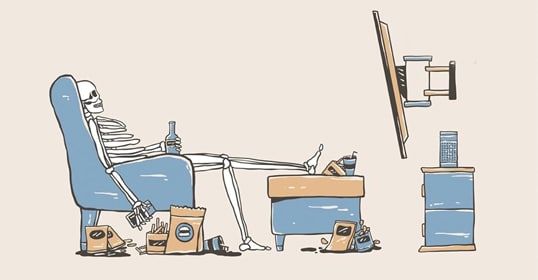 Skeleton in a relaxed pose sitting at a cluttered desk with fast food waste, symbolizing excessive screen time and neglect of health, as discussed in Podcast #941: Avoid Death by Comfort.