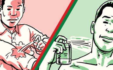 A man is holding a spray bottle and another man is following proper dos and don'ts in applying cologne.