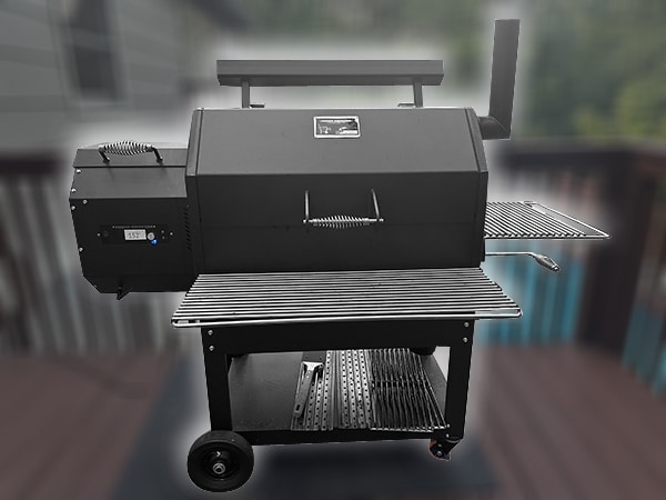 Black outdoor wood pellet smoker on a wheeled cart with side shelves.
