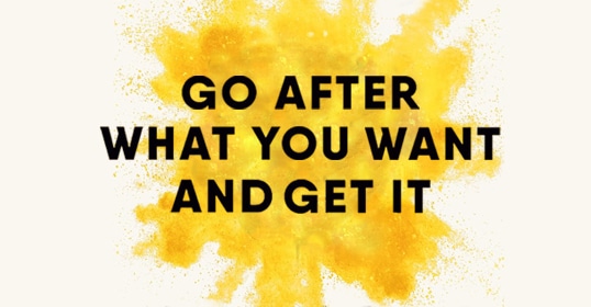 Text reading “GO AFTER WHAT YOU WANT AND GET IT” overlaid on a yellow paint splatter background, inspiring you to turn vices into virtues and fuel your career advancement.