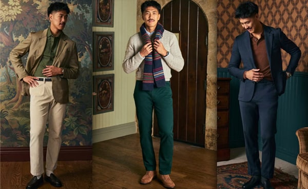 A man modeling smart casual holiday looks: a tan suit, a light sweater with scarf and green pants, and a navy suit with a brown shirt, each styled in unique indoor settings.