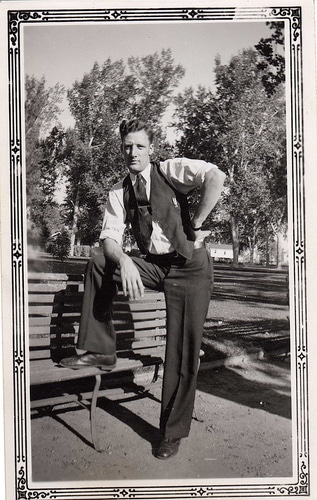Vintage Morgan giving pose at bench.