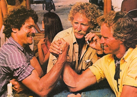 Vintage men doing arm wrestling.