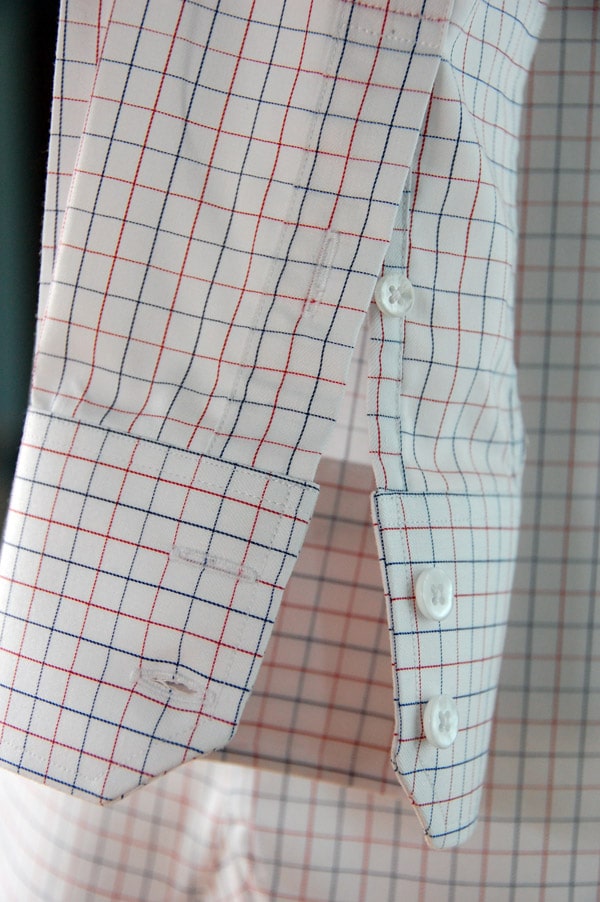 Dress shirt sleeve with cuff button.